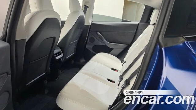 Tesla Model Y — Фото автомобиля 25