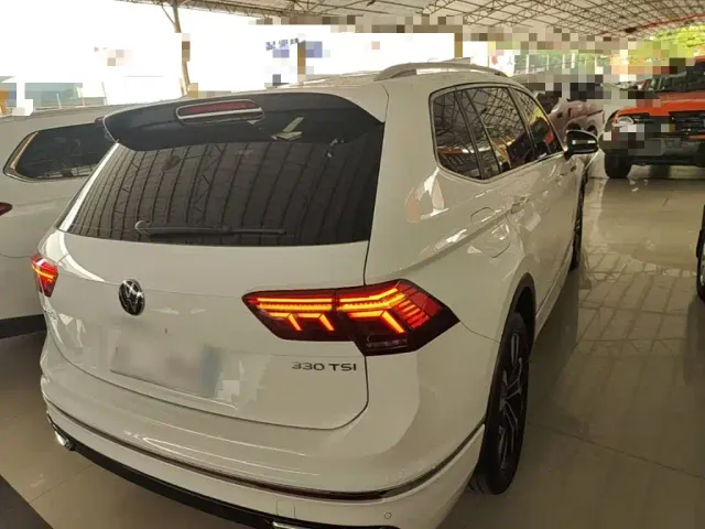 Volkswagen Tiguan L — Фото автомобиля 6