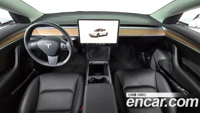 Tesla Model 3 — Фото автомобиля 7