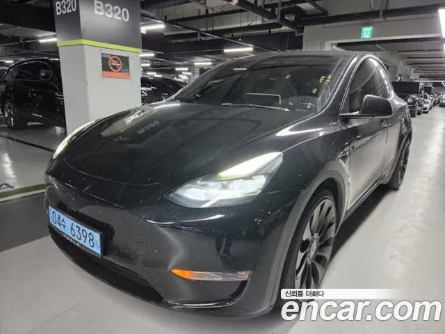 Tesla Model Y — Фото автомобиля 2