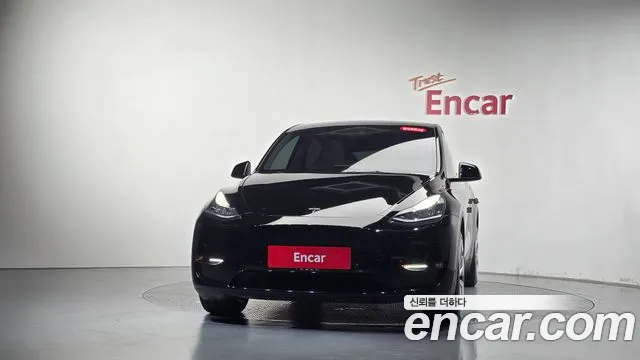 Tesla Model Y — Фото автомобиля 3