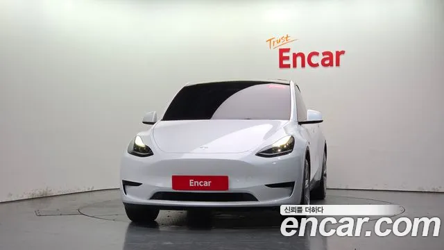 Tesla Model Y — Фото автомобиля 2