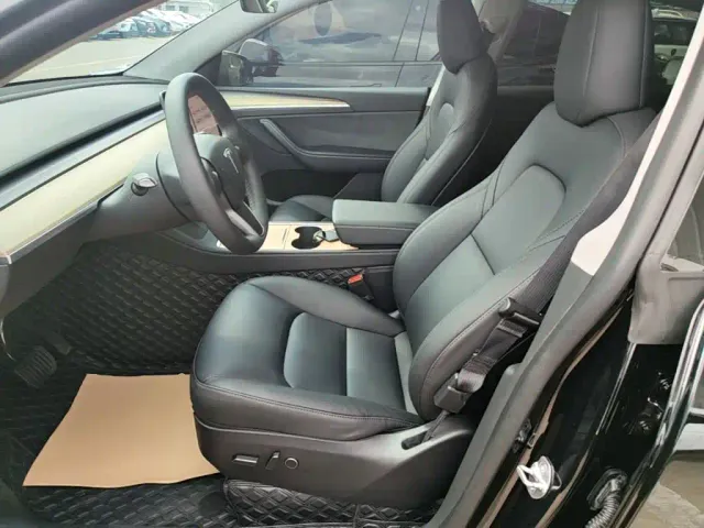 Tesla Model Y — Фото автомобиля 10