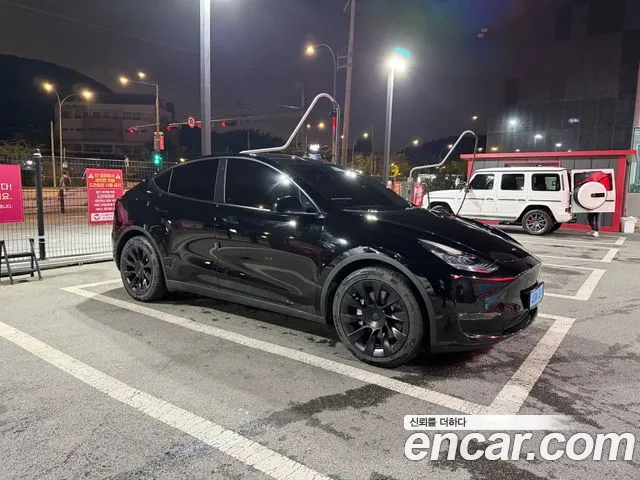 Tesla Model Y — Фото автомобиля 3