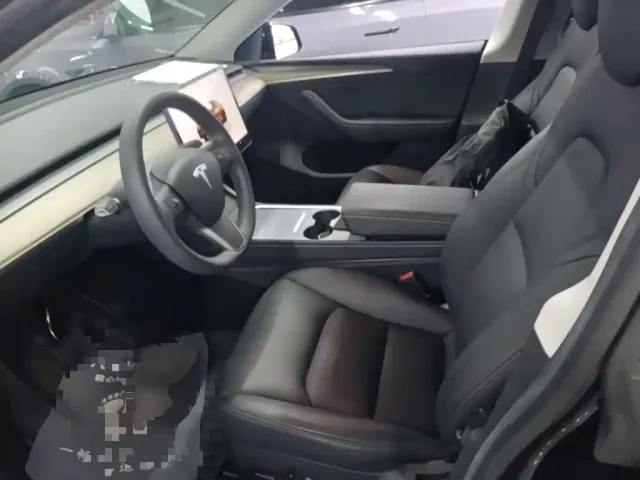 Tesla Model Y — Фото автомобиля 14