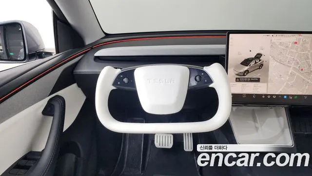 Tesla Model Y — Фото автомобиля 10