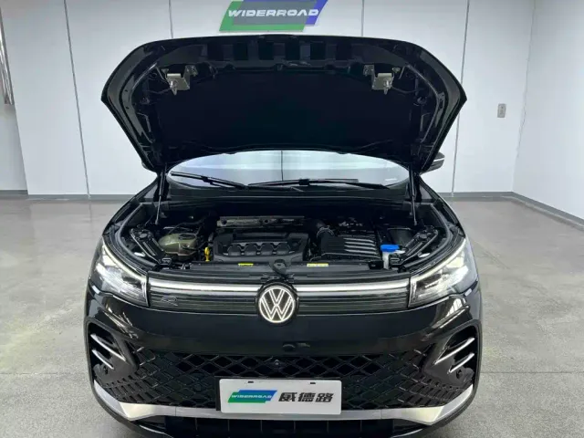 Volkswagen Tiguan L — Фото автомобиля 15