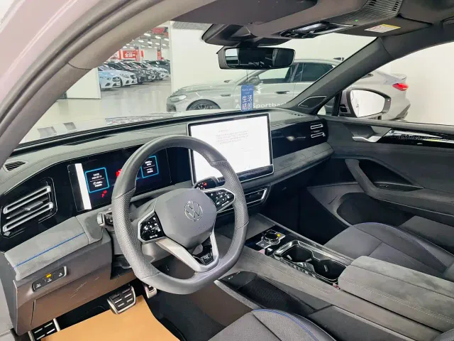 Volkswagen Tiguan L — Фото автомобиля 6