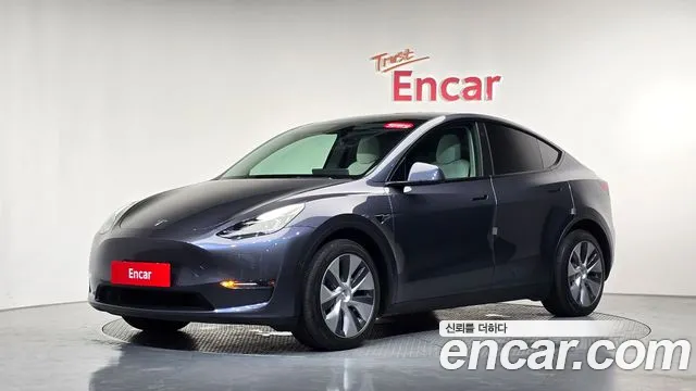 Tesla Model Y — Фото автомобиля 10