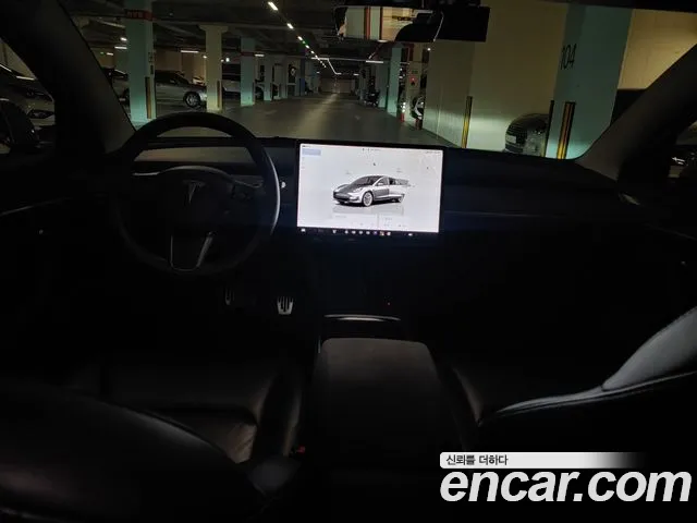 Tesla Model 3 — Фото автомобиля 12
