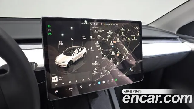 Tesla Model Y — Фото автомобиля 19