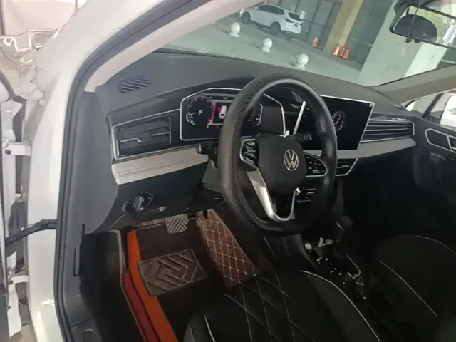 Volkswagen Tiguan L — Фото автомобиля 9
