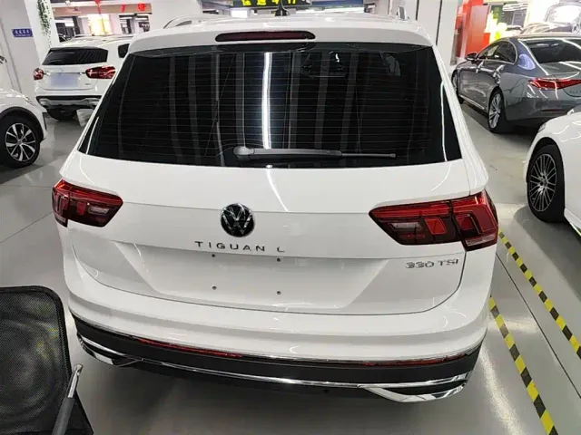 Volkswagen Tiguan L — Фото автомобиля 5