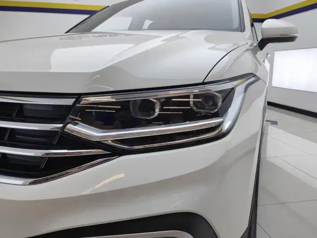 Volkswagen Tiguan L — Фото автомобиля 5