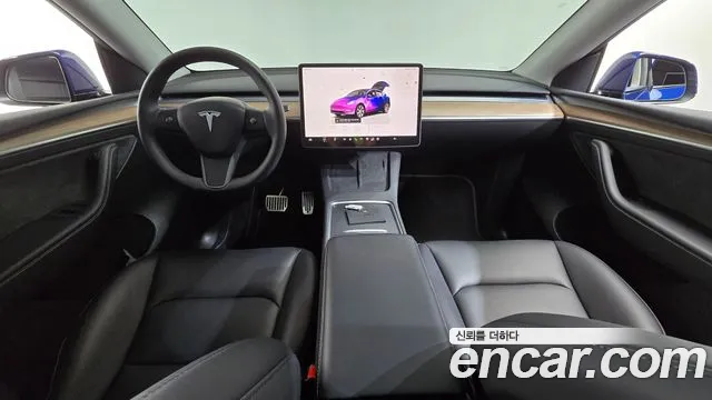 Tesla Model Y — Фото автомобиля 10