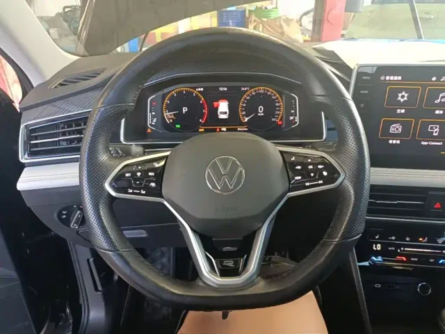 Volkswagen Tiguan L — Фото автомобиля 10