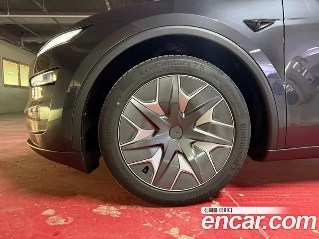 Tesla Model Y — Фото автомобиля 5