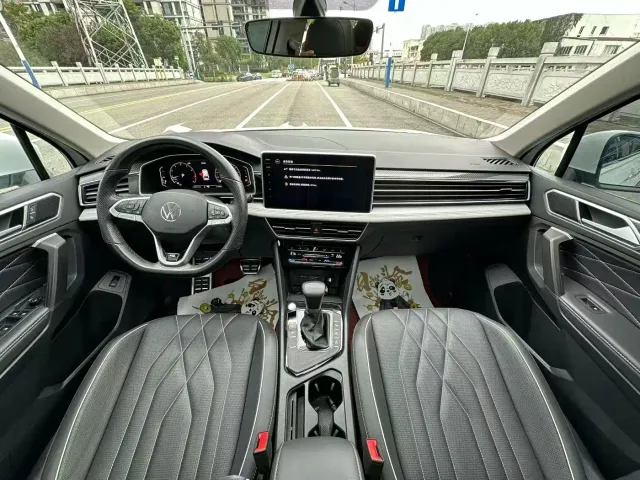 Volkswagen Tiguan L — Фото автомобиля 6