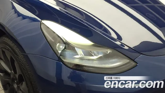 Tesla Model 3 — Фото автомобиля 7
