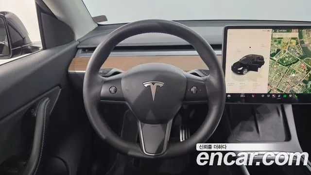 Tesla Model Y — Фото автомобиля 13