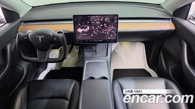 Tesla Model Y — Фото автомобиля 7
