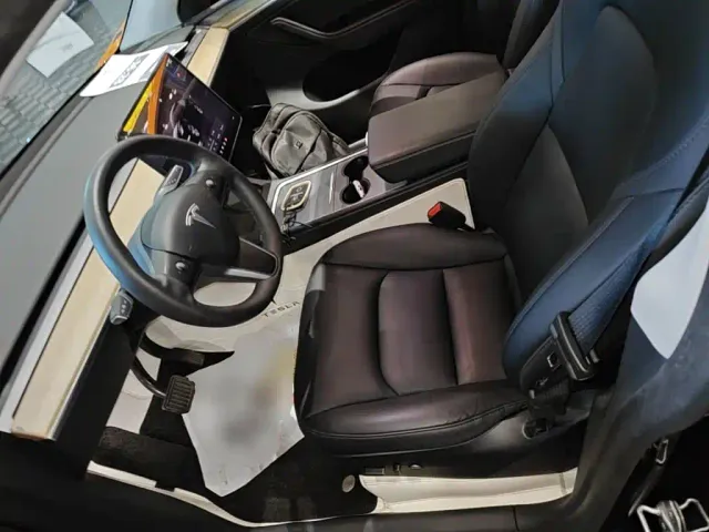 Tesla Model Y — Фото автомобиля 14