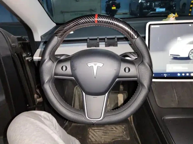 Tesla Model Y — Фото автомобиля 14