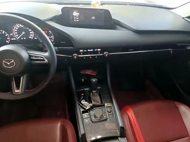 Mazda Axela — Фото автомобиля 12