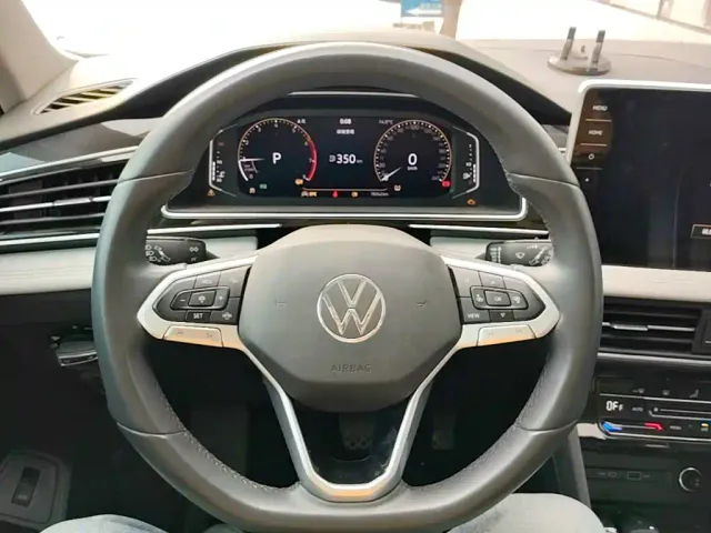 Volkswagen Tiguan L — Фото автомобиля 10