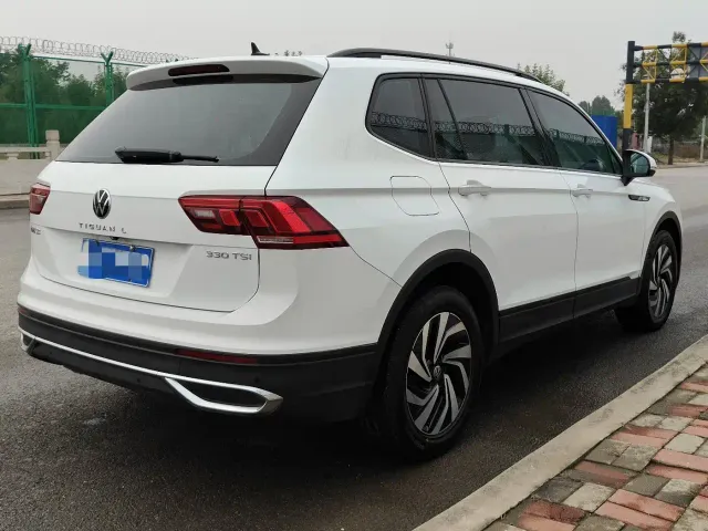 Volkswagen Tiguan L — Фото автомобиля 6