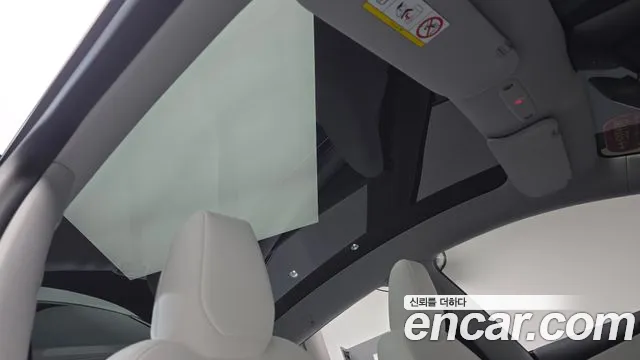Tesla Model Y — Фото автомобиля 24