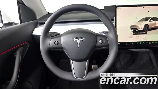 Tesla Model Y — Фото автомобиля 6