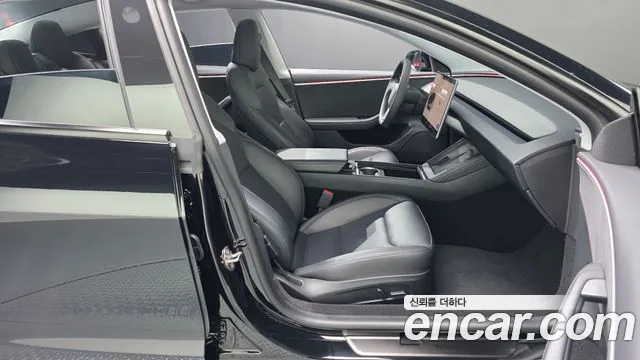 Tesla Model 3 — Фото автомобиля 15
