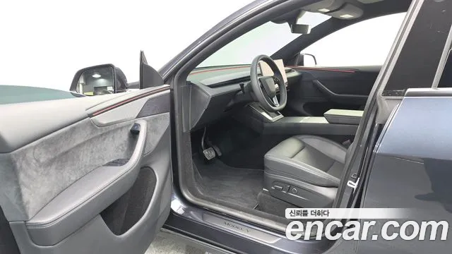 Tesla Model Y — Фото автомобиля 15