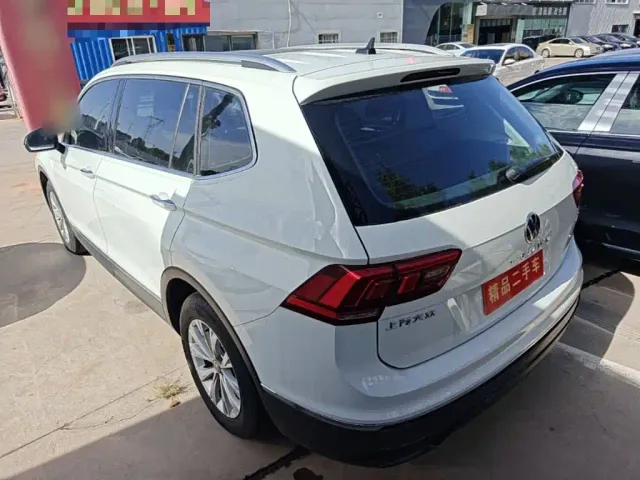Volkswagen Tiguan L — Фото автомобиля 4