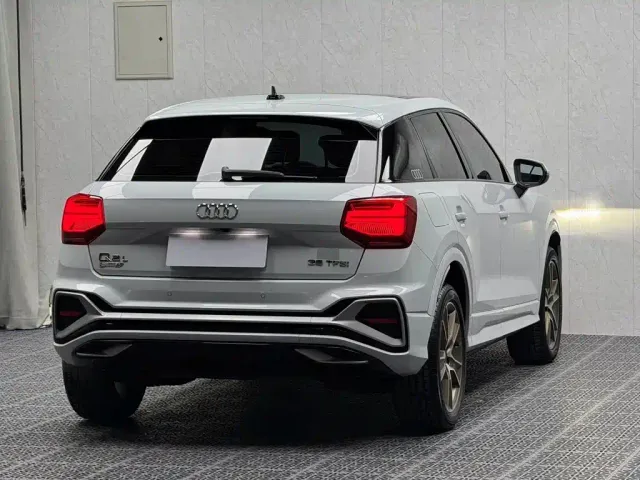 Audi Q2L — Фото автомобиля 9