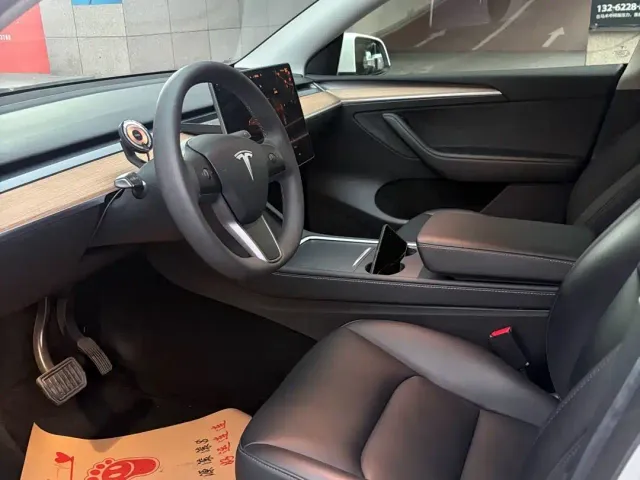 Tesla Model Y — Фото автомобиля 7