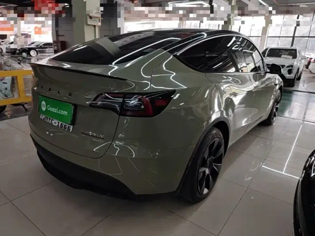 Tesla Model Y — Фото автомобиля 6