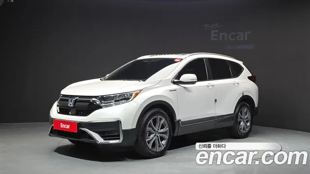 Фотография автомобиля — Honda CR-V CR-V 5-е поколение 2.0 гибрид Touring 4WD