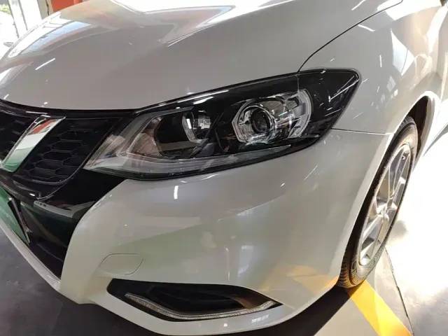 Nissan Tiida — Фото автомобиля 23