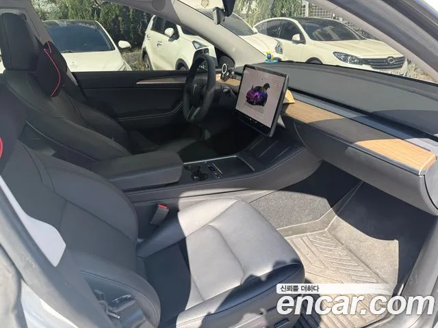 Tesla Model Y — Фото автомобиля 7