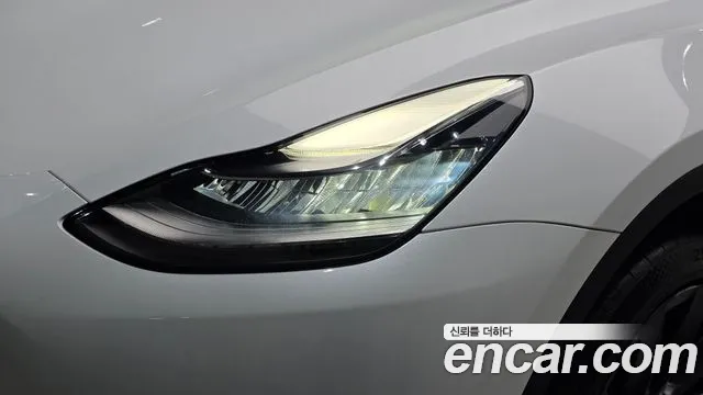 Tesla Model Y — Фото автомобиля 7