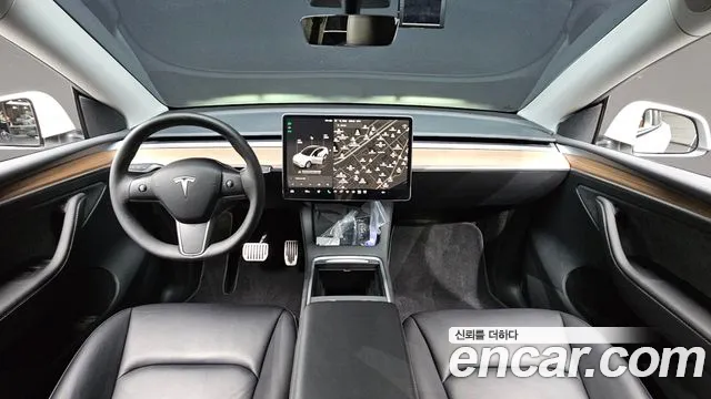 Tesla Model Y — Фото автомобиля 10