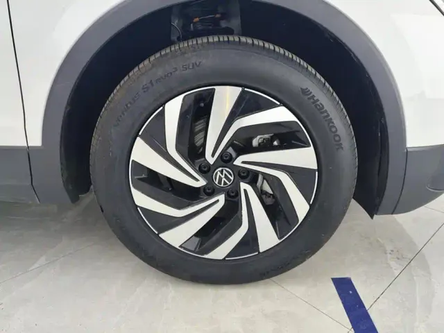 Volkswagen Tiguan L — Фото автомобиля 6