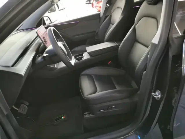 Tesla Model Y — Фото автомобиля 14