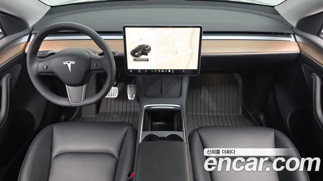 Tesla Model Y — Фото автомобиля 7