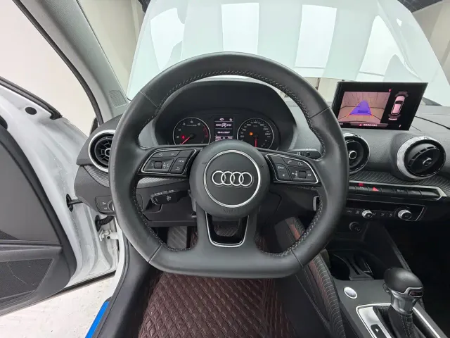 Audi Q2L — Фото автомобиля 11