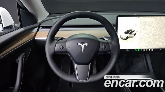 Tesla Model Y — Фото автомобиля 13
