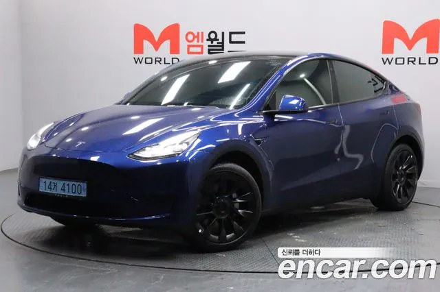 Tesla Model Y — Фото автомобиля 2