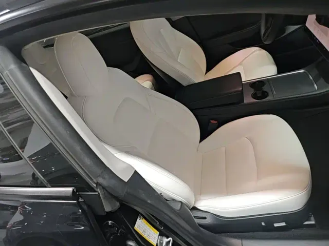 Tesla Model 3 — Фото автомобиля 24